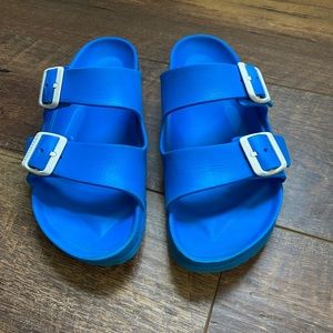 Blue plastic Birkenstocks